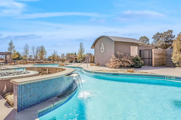 a view of a house with a swimming pool