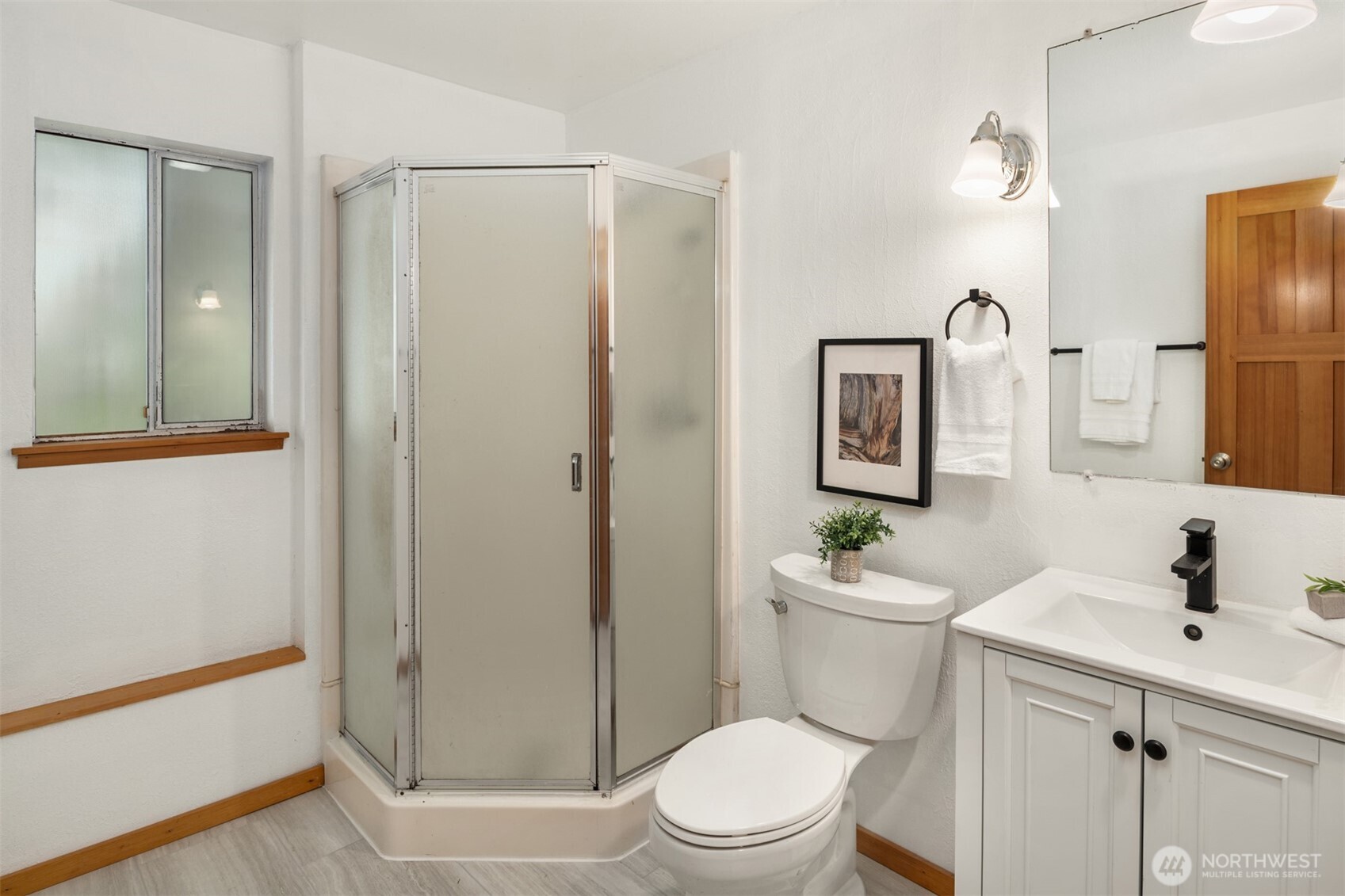 418 212th Street Southwest Bothell, WA 98021 - Photo 27 of 40 a bathroom with a sink a toilet and shower
