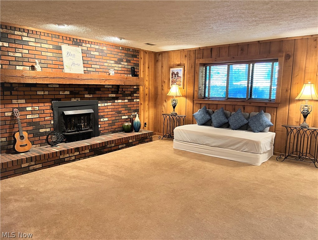 35655 Timber Ridge Lane Willoughby, OH 44094 - Photo 18 of 32 Family room in lower level is open and spacious with brick wall and 2nd wood burning fireplace and