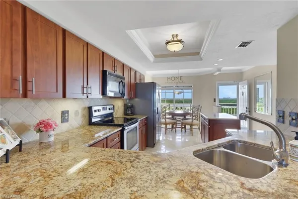 $559,000 | 13105 Vanderbilt Drive, Unit 607, Naples, FL 34110