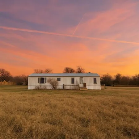 a view of a house with a big yard