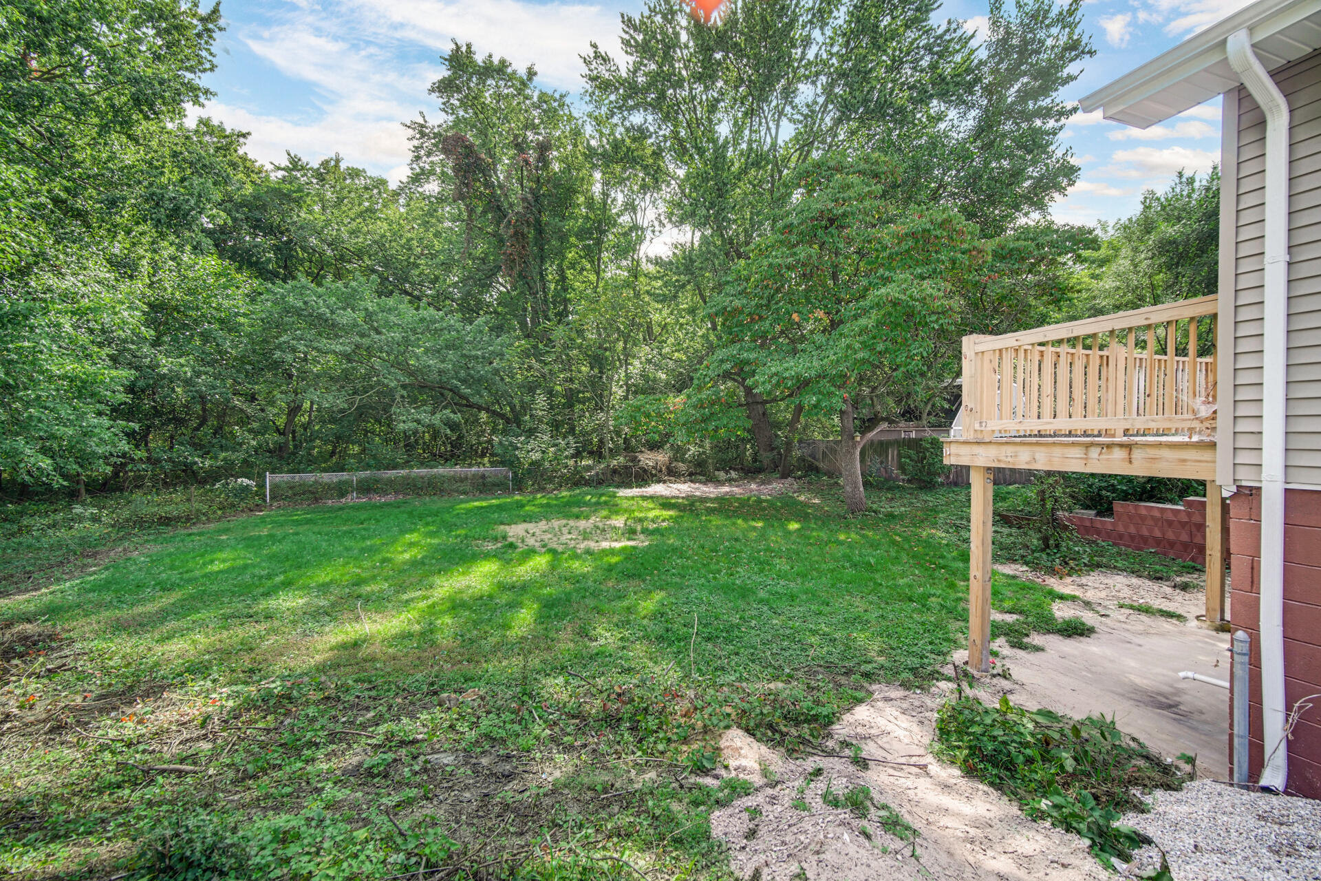 3015 West Ridge Road Hobart, IN 46342 - Photo 21 of 22 a view of a chair and table in the garden