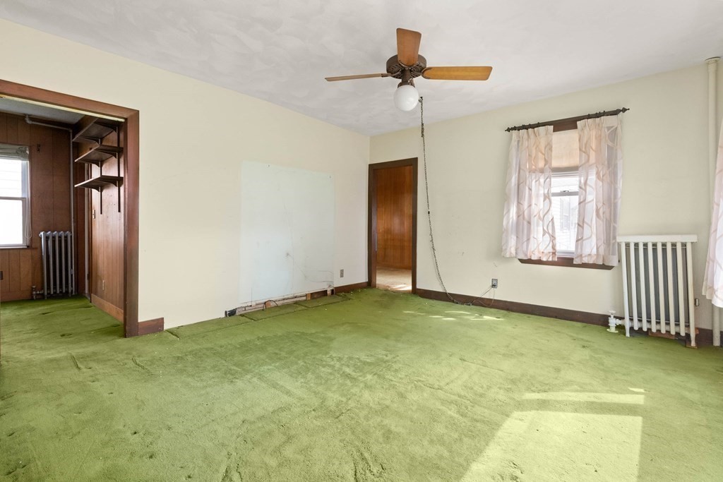 31 Andover Street Peabody, MA 01960 - Photo 11 of 40 a view of empty room with ceiling fan