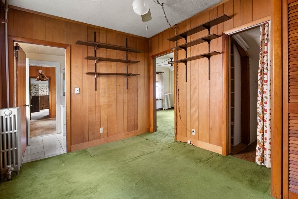31 Andover Street Peabody, MA 01960 - Photo 16 of 40 an empty room with entrance and door