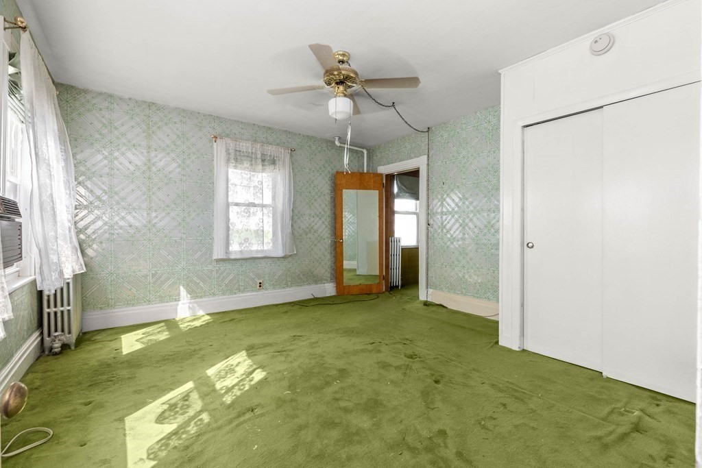 31 Andover Street Peabody, MA 01960 - Photo 21 of 40 a view of an empty room with a window