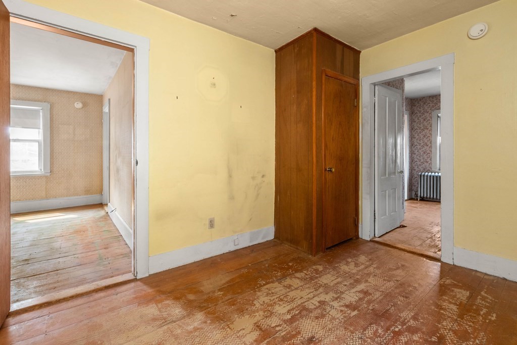 31 Andover Street Peabody, MA 01960 - Photo 29 of 40 an empty room with windows and closet