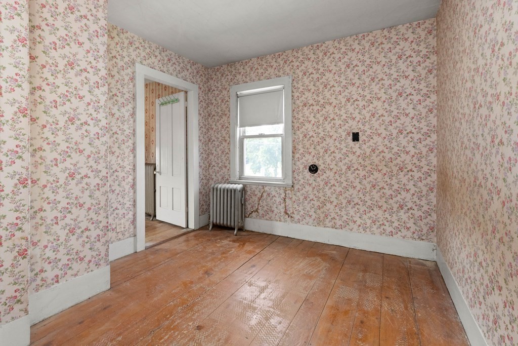 31 Andover Street Peabody, MA 01960 - Photo 35 of 40 a view of an empty room with a window