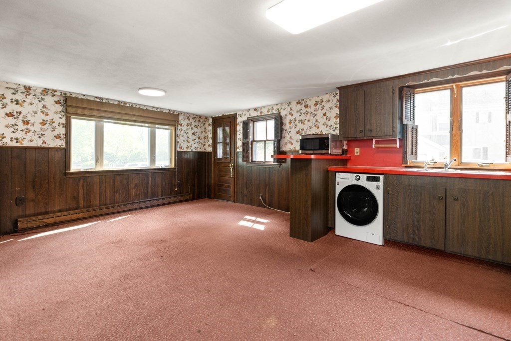 31 Andover Street Peabody, MA 01960 - Photo 4 of 40 a kitchen that has a stove and a sink