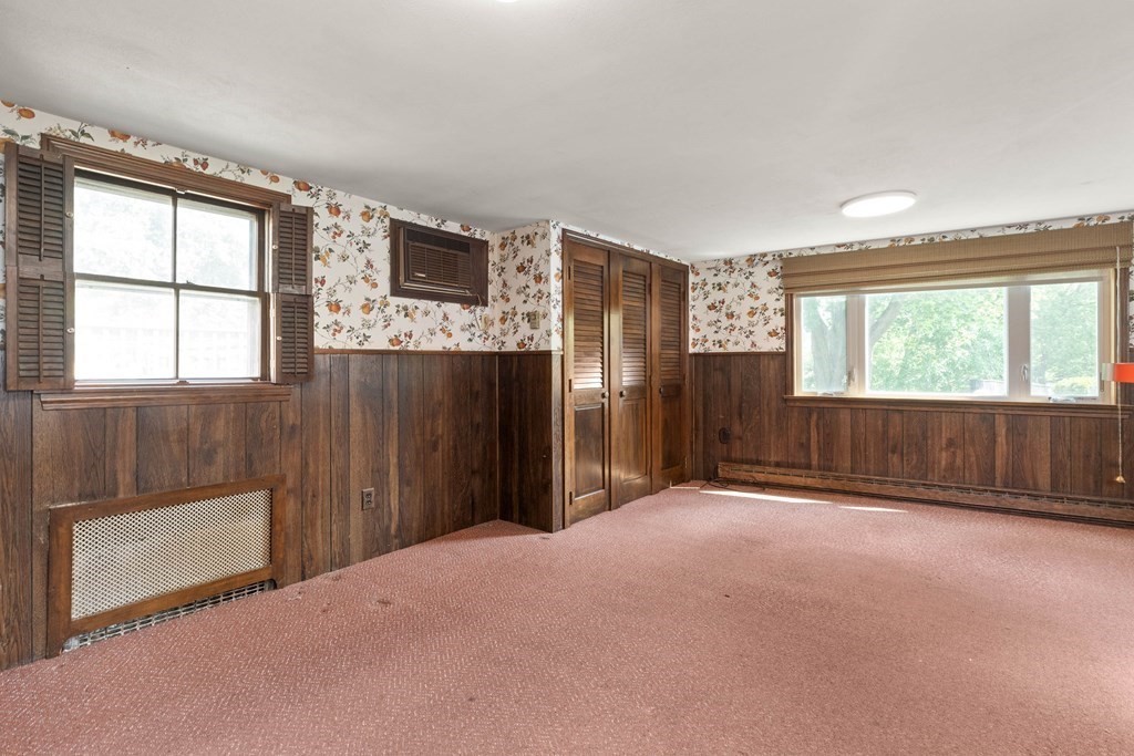 31 Andover Street Peabody, MA 01960 - Photo 7 of 40 an empty room with windows