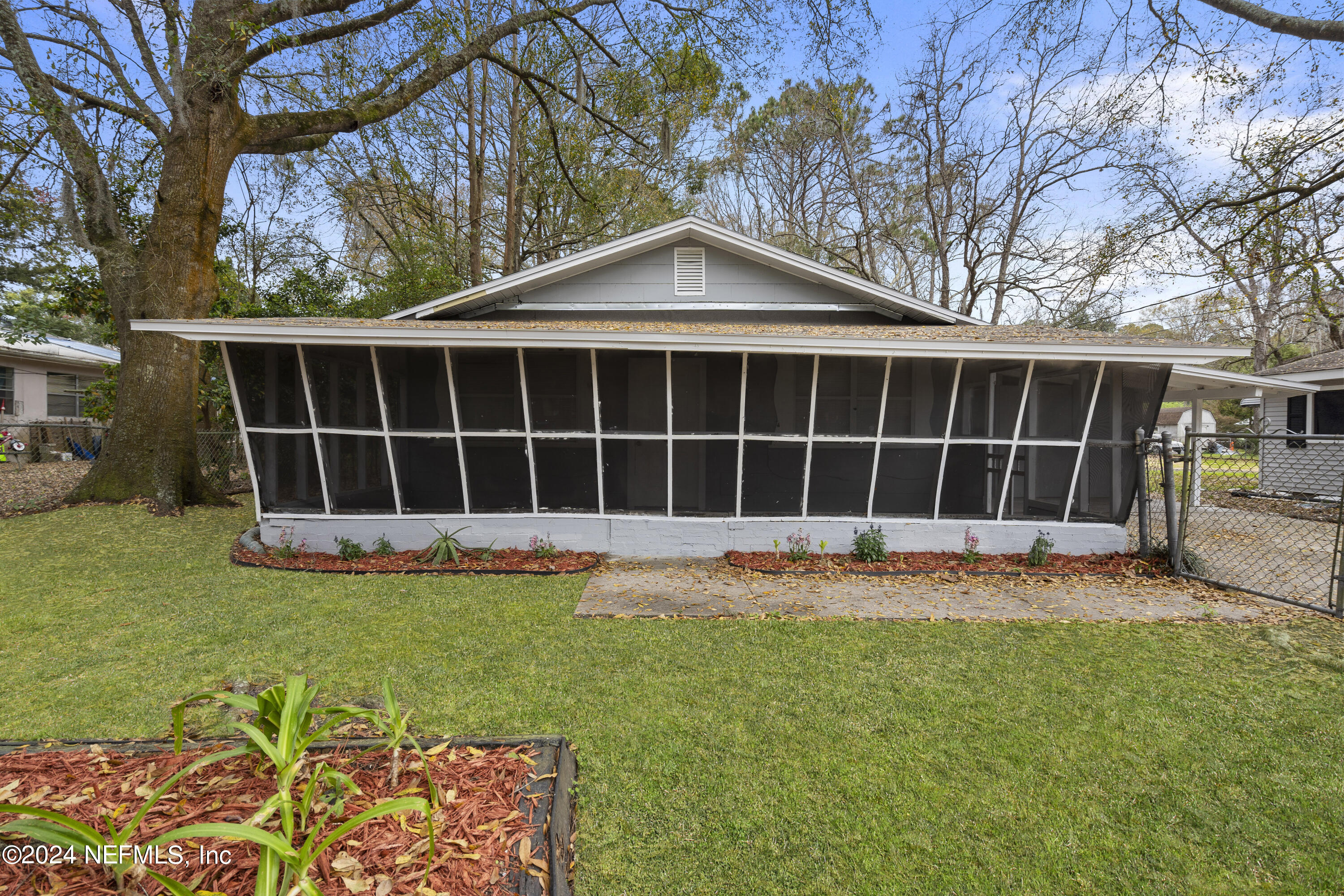 1174 Mohawk Street Jacksonville, FL 32205 - Photo 1 of 33 a house view with a garden space