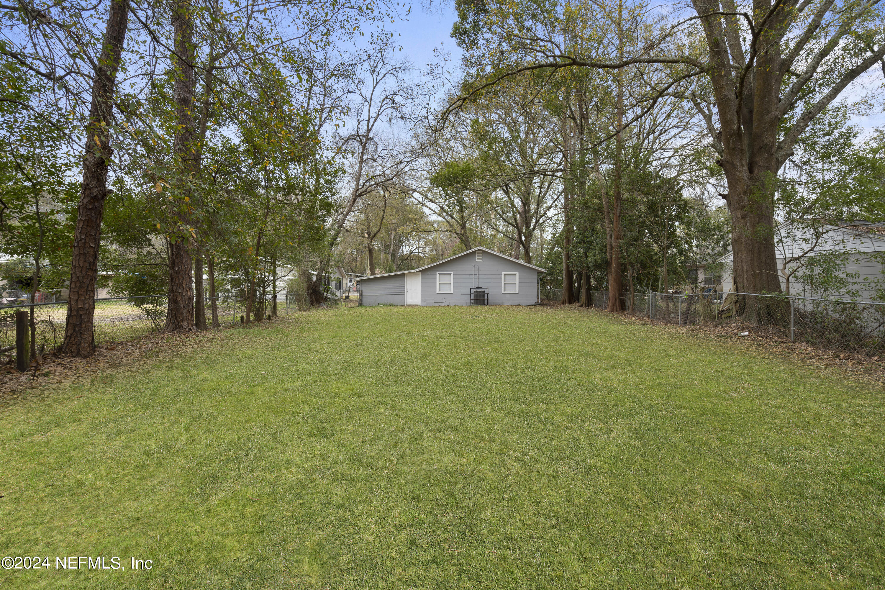 1174 Mohawk Street Jacksonville, FL 32205 - Photo 33 of 33 a view of a house with a yard