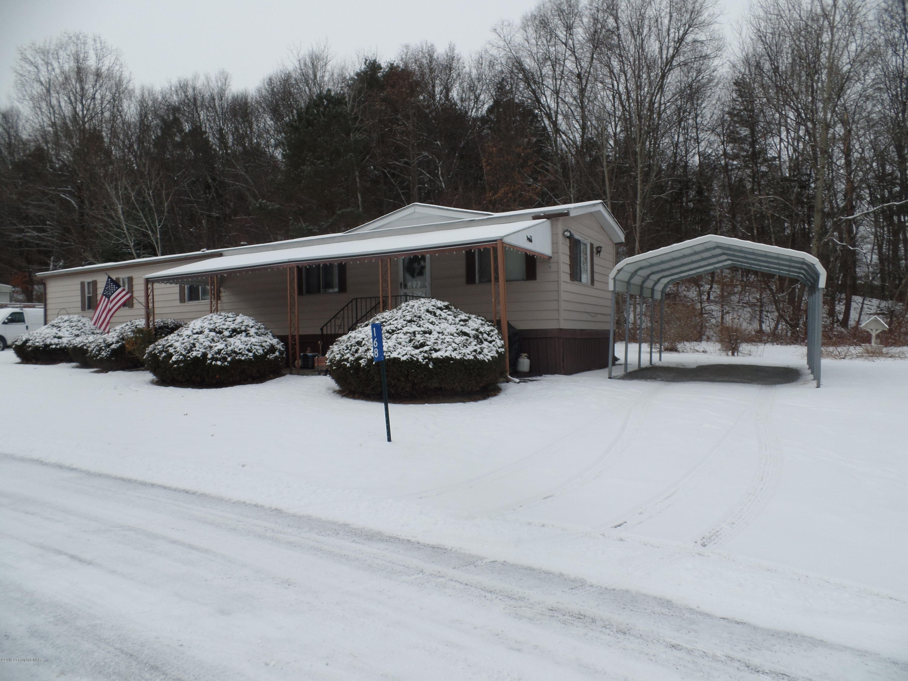 168 Fawn Valley Road Stroudsburg, PA 18360 - Photo 1 of 12 a front view of a house with garden