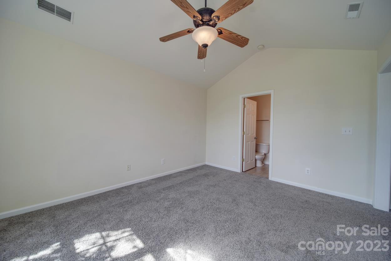 1919 Travertine Lane Fort Mill, SC 29708 - Photo 27 of 34 a view of an empty room and a fan
