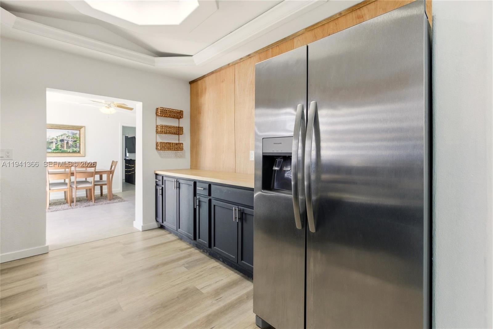 2124 Gardenview Road Sebring, FL 33870 - Photo 11 of 54 a kitchen with stainless steel appliances granite countertop a refrigerator and a sink