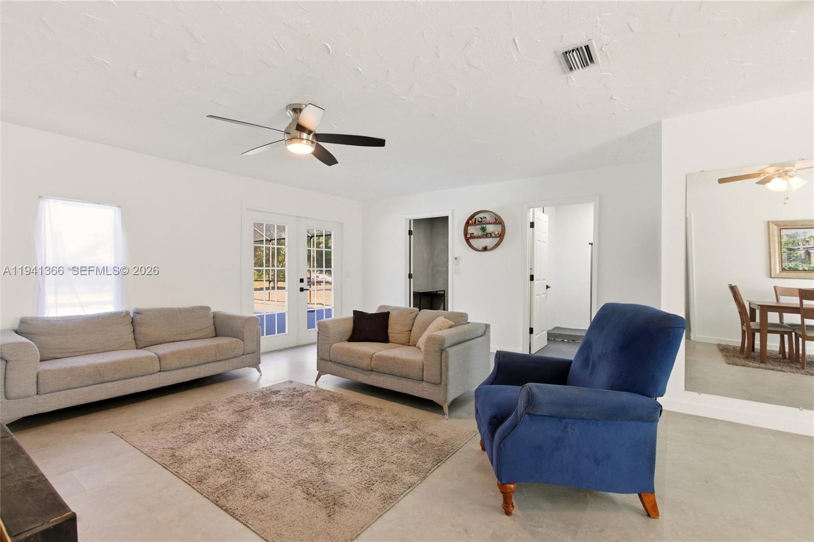 2124 Gardenview Road Sebring, FL 33870 - Photo 2 of 54 a living room with furniture and a large window