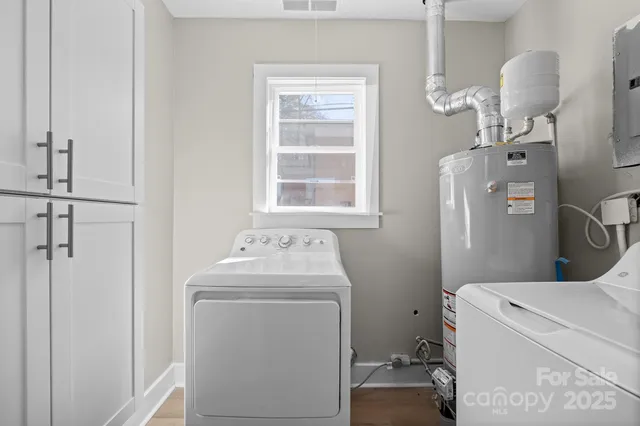 a utility room with dryer and washer