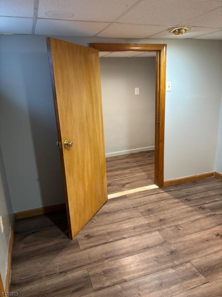 358 Woodland Road, Unit 2 Madison, NJ 07940 - Photo 41 of 50 a view of an empty room with wooden floor