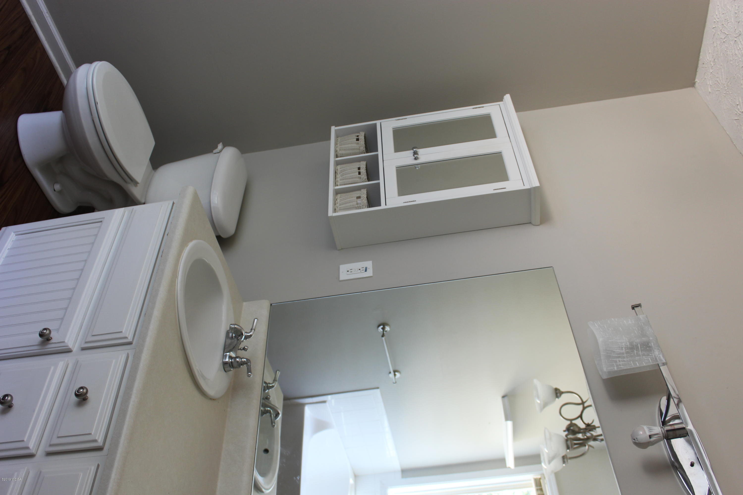 318 Hickory Road Jackson, GA 30233 - Photo 11 of 13 a utility room with multiple dryer and washer