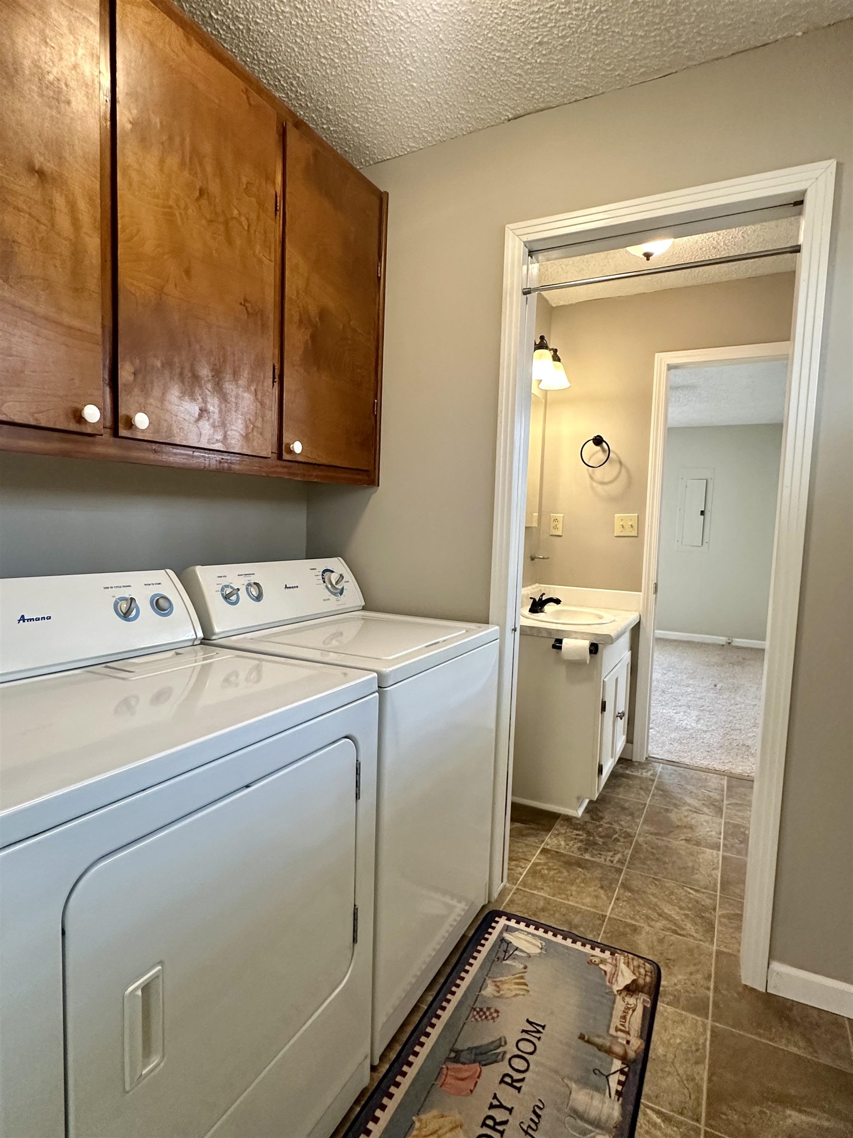 170 Mitchell Street Selmer, TN 38375 - Photo 22 of 26 a utility room with dryer and washer