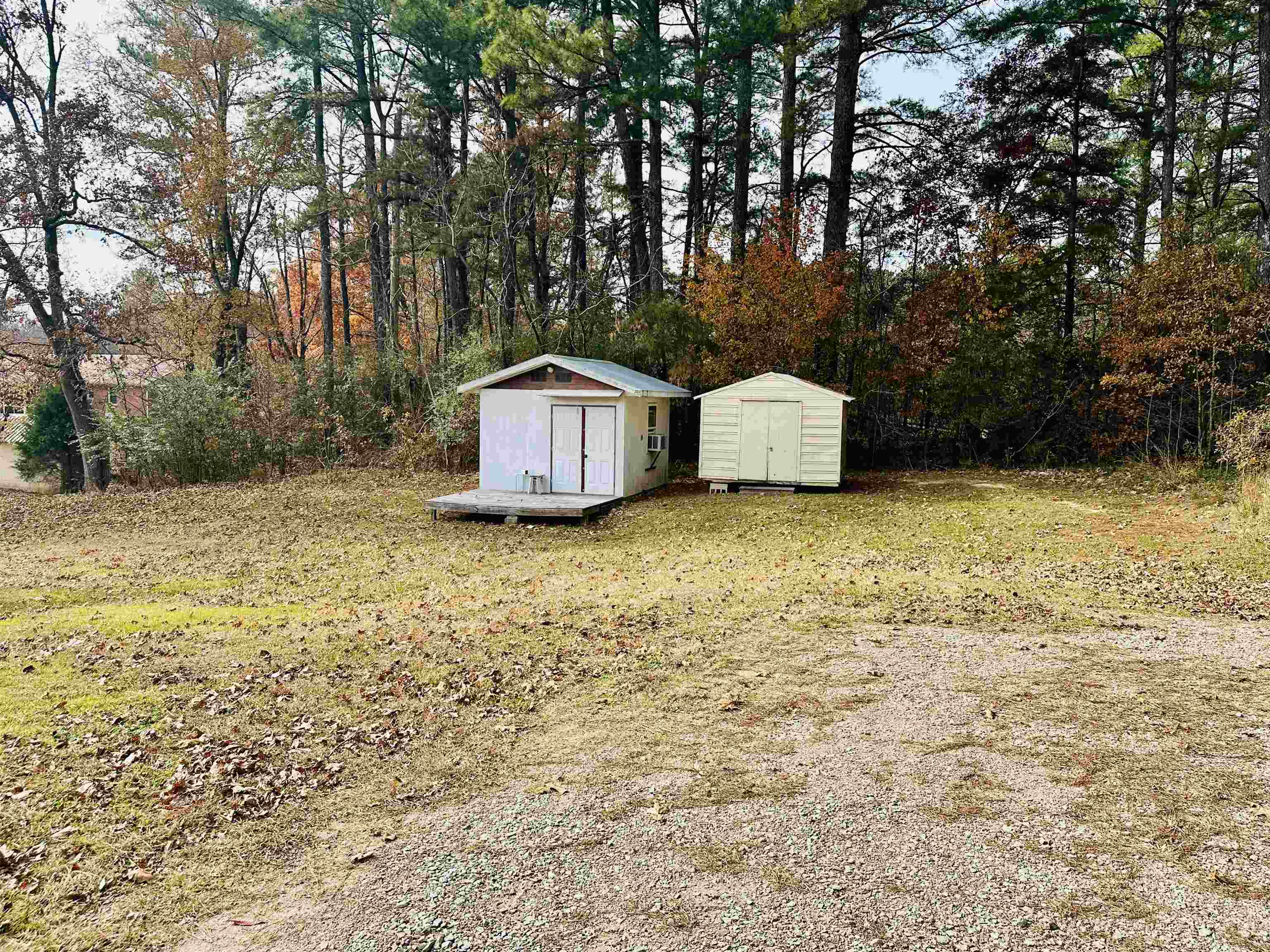 170 Mitchell Street Selmer, TN 38375 - Photo 24 of 26 a white house that has a tree in front of it