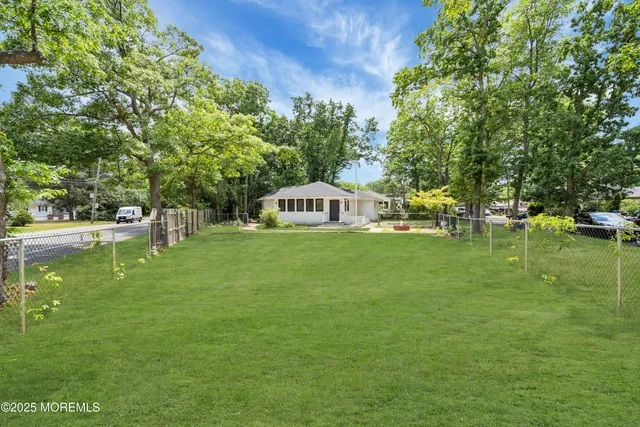 a house view with a garden space