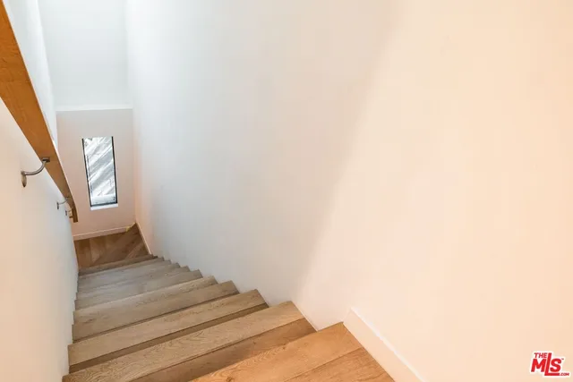 a workspace with furniture and window