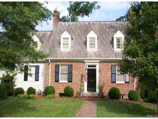 1807 Knox Road Raleigh, NC 27608 - Photo 1 of 1 front view of a house with a yard