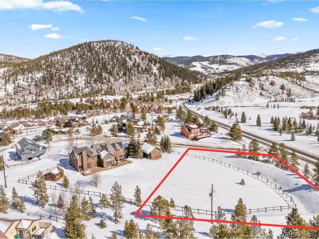 an aerial view of residential house with parking space