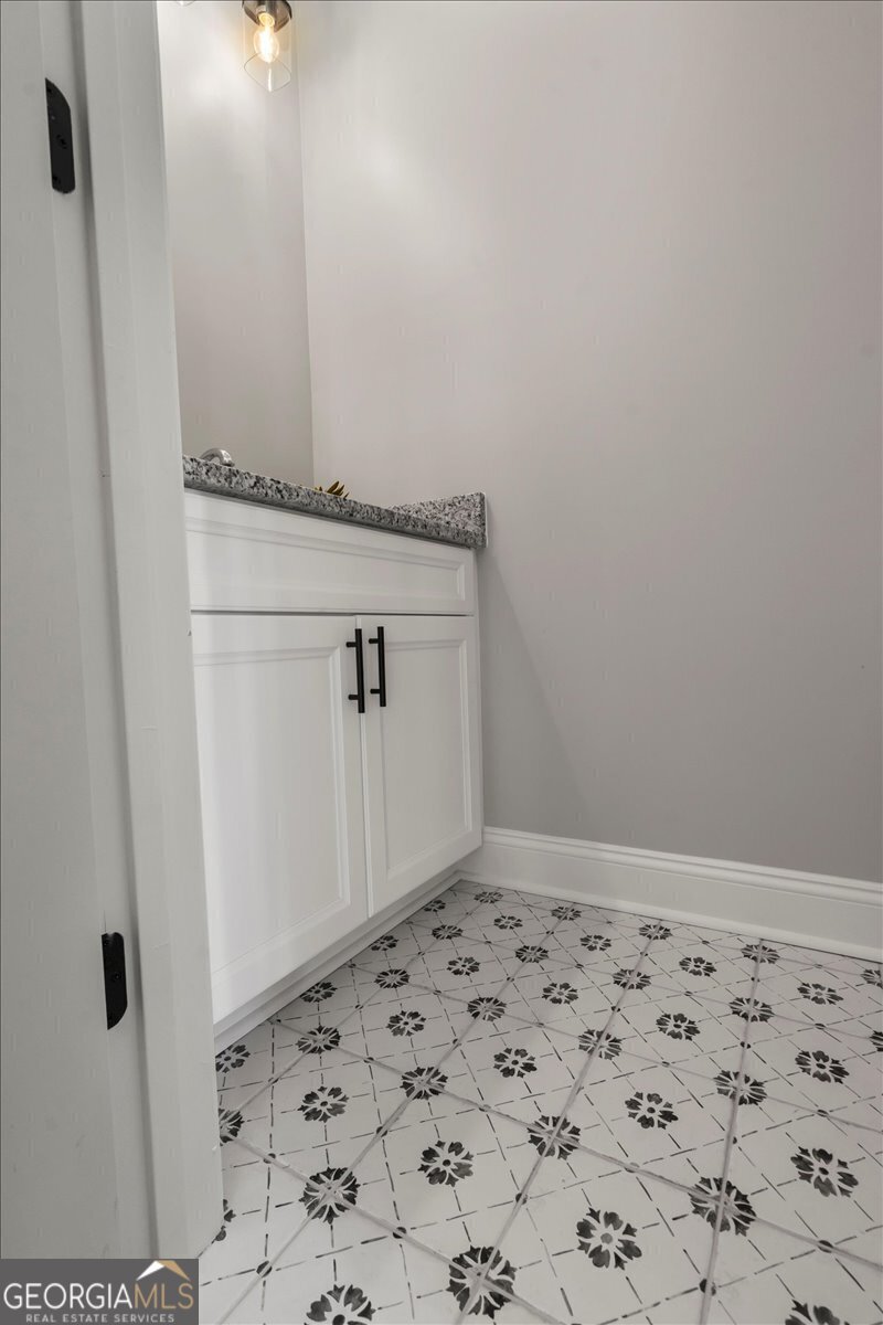 323 South Madison Avenue Monroe, GA 30655 - Photo 15 of 39 a bathroom with a sink