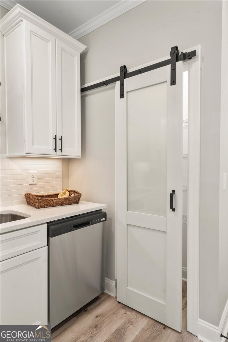 323 South Madison Avenue Monroe, GA 30655 - Photo 19 of 39 a utility room with dryer and washer
