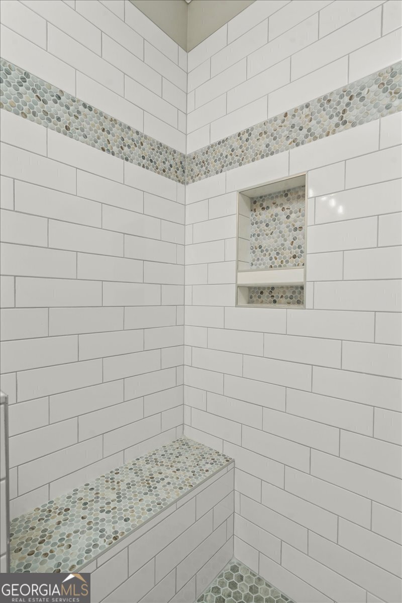 323 South Madison Avenue Monroe, GA 30655 - Photo 27 of 39 a bathroom with a shower