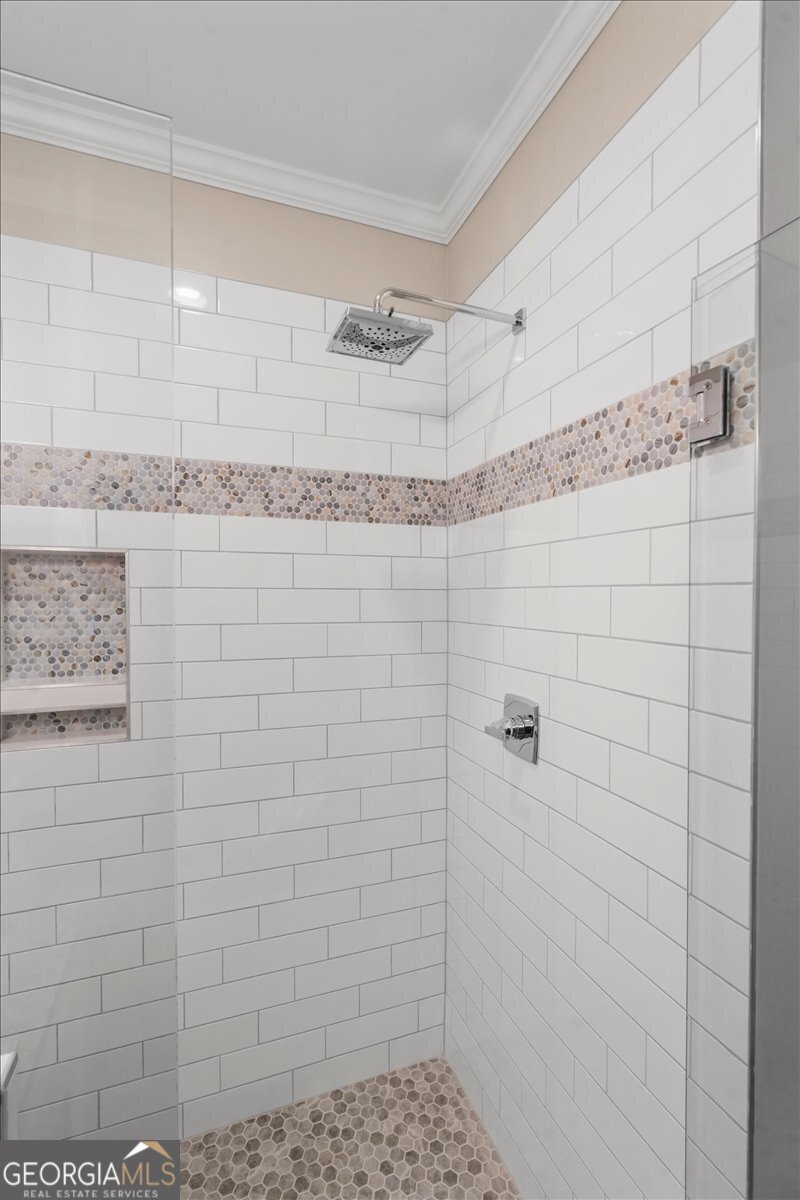 323 South Madison Avenue Monroe, GA 30655 - Photo 28 of 39 a bathroom with a shower