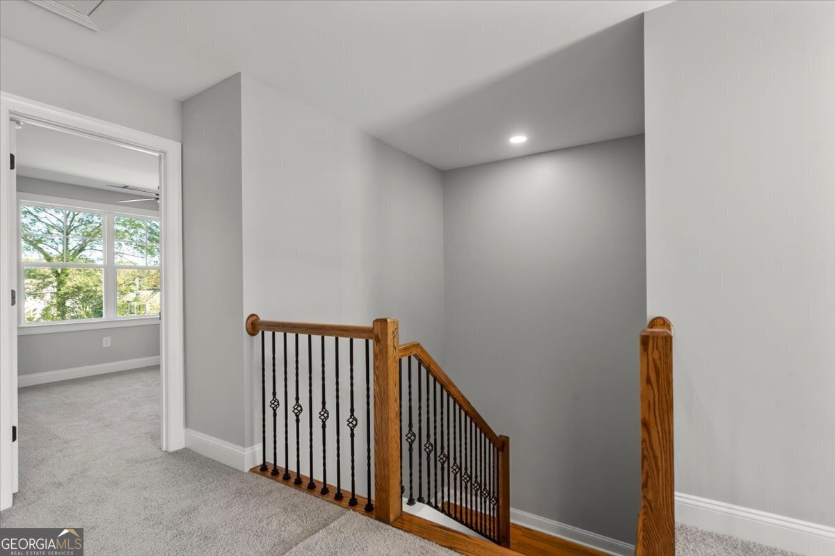 323 South Madison Avenue Monroe, GA 30655 - Photo 31 of 39 a view of hallway with stairs