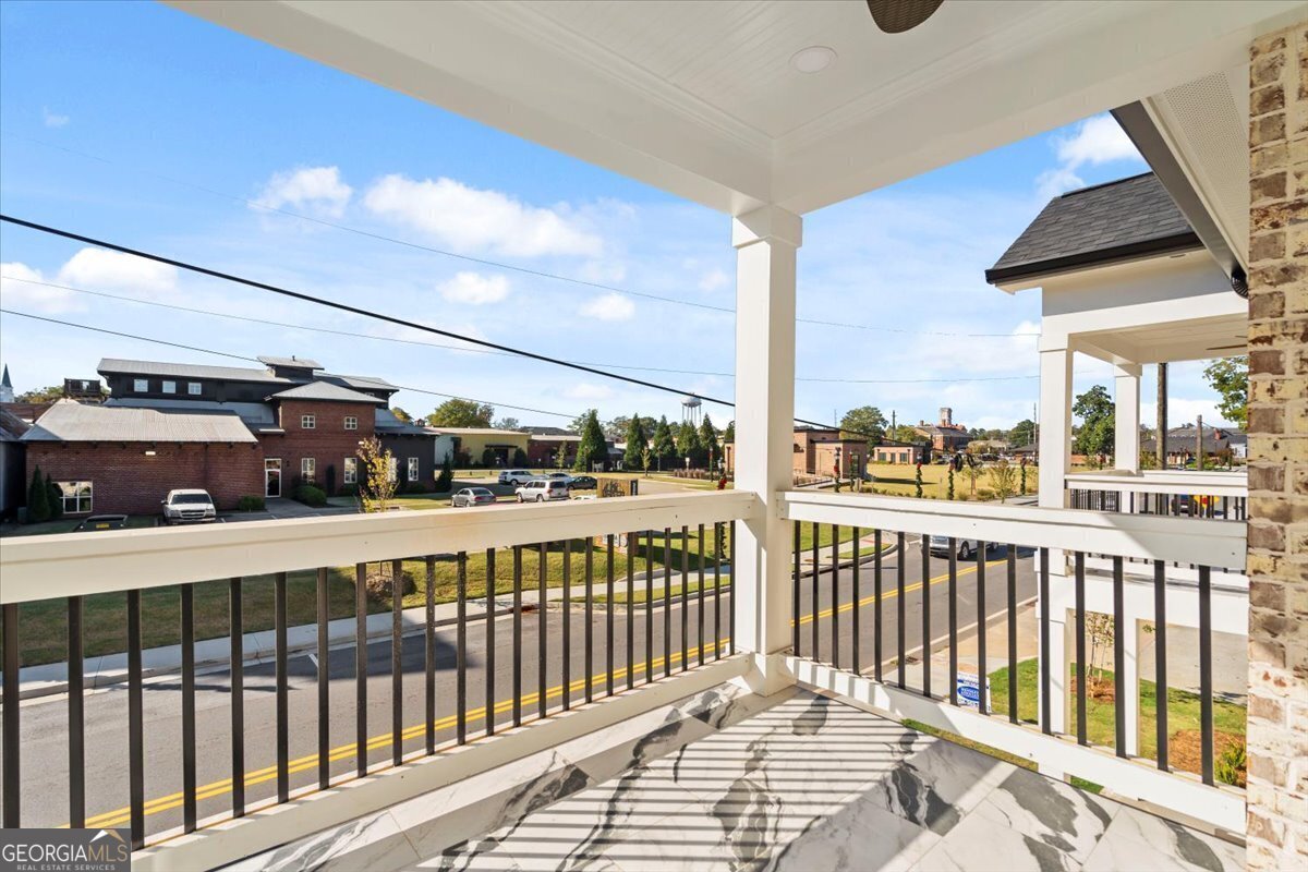 323 South Madison Avenue Monroe, GA 30655 - Photo 34 of 39 a view of a balcony with city view