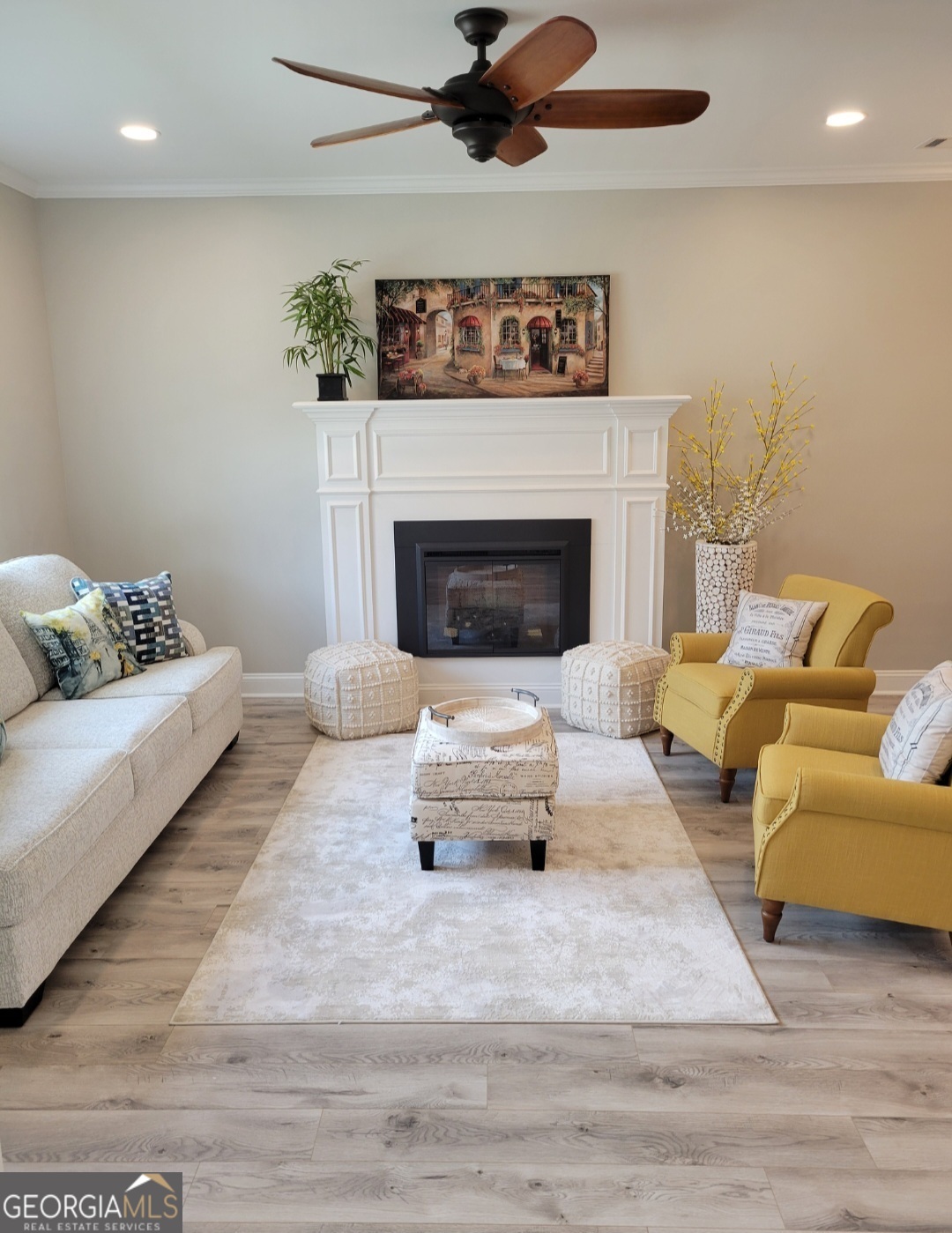 323 South Madison Avenue Monroe, GA 30655 - Photo 5 of 39 a living room with furniture and a fireplace