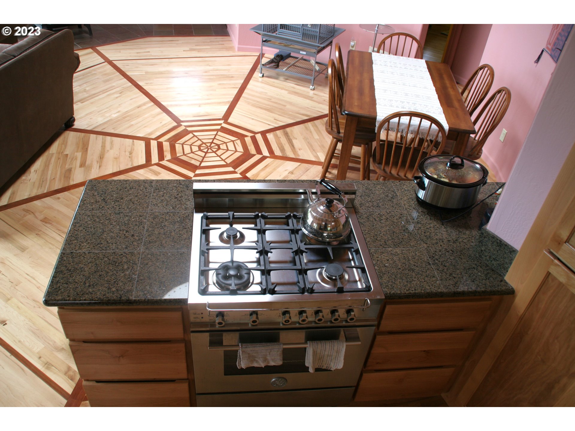 35606 Coy Creek Road Gold Beach, OR 97444 - Photo 17 of 48 a kitchen with a stove and a microwave