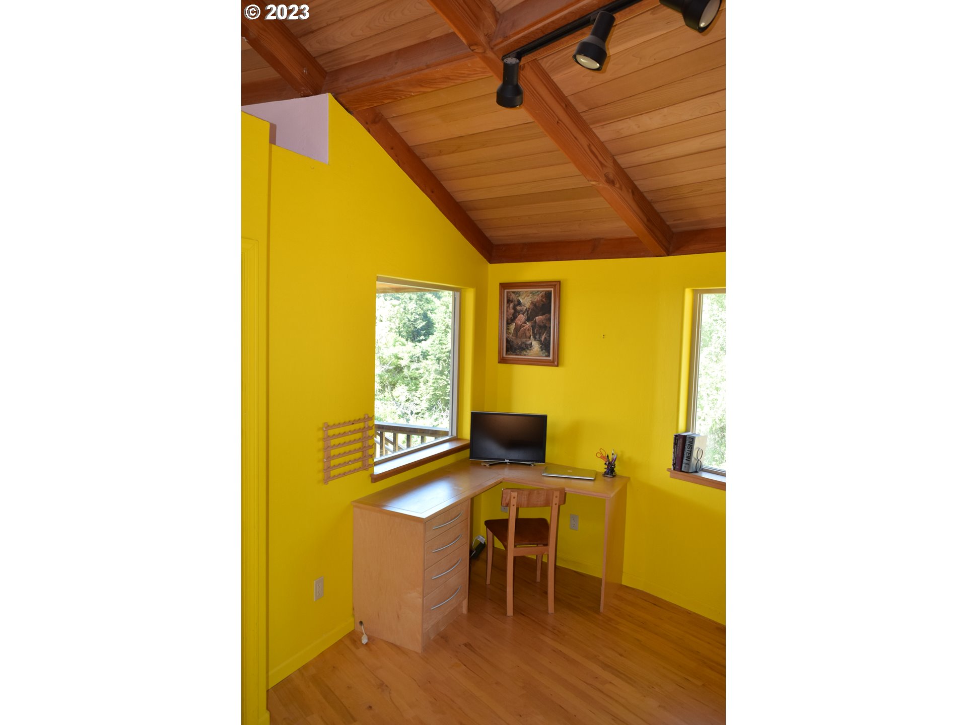 35606 Coy Creek Road Gold Beach, OR 97444 - Photo 22 of 48 a view of a dining room with furniture and wooden floor