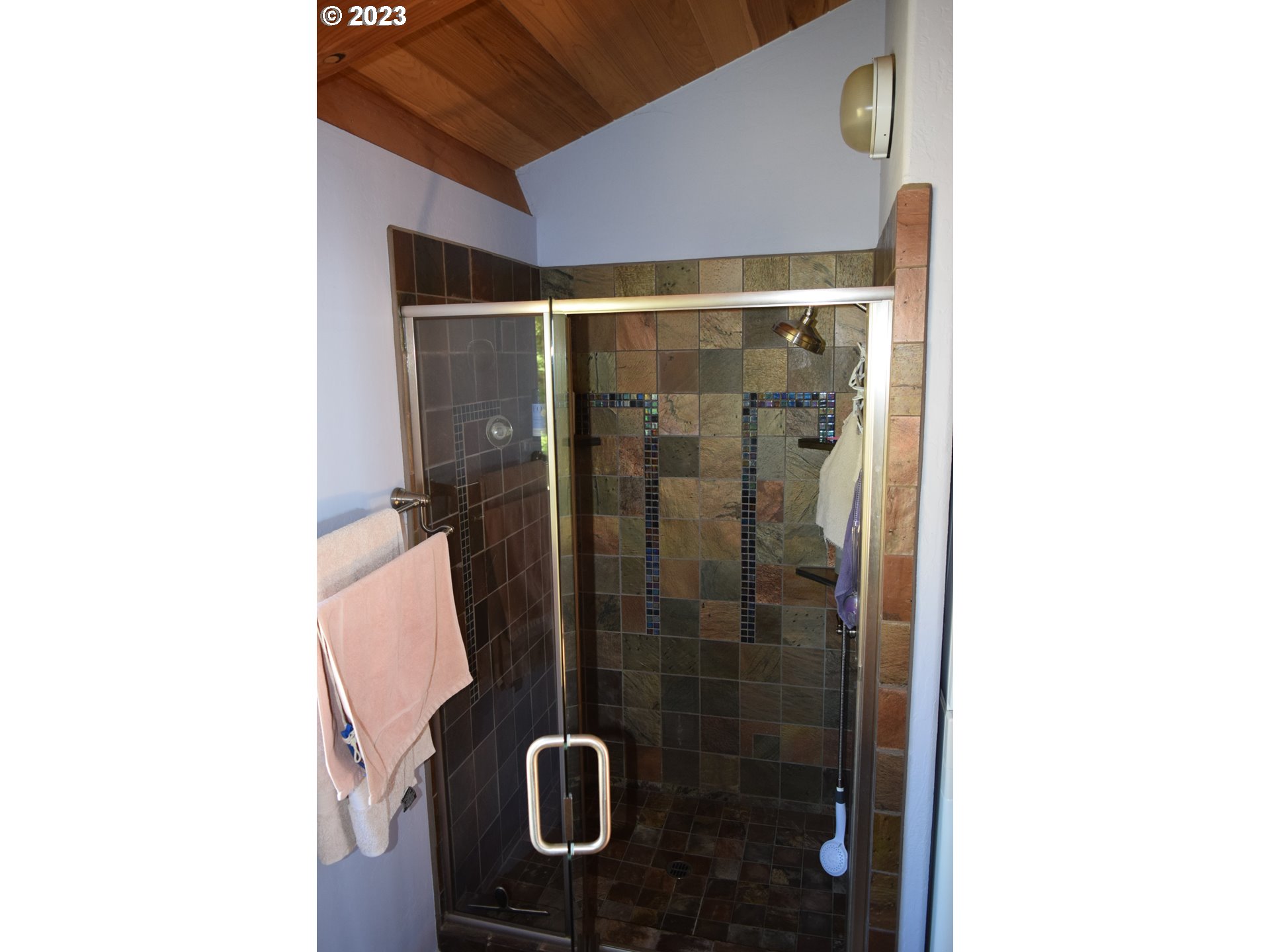 35606 Coy Creek Road Gold Beach, OR 97444 - Photo 30 of 48 a bathroom with a shower