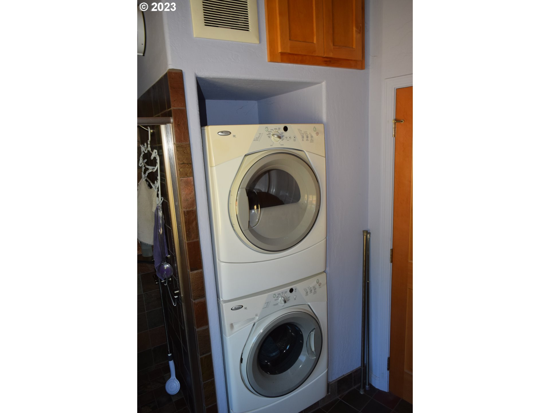 35606 Coy Creek Road Gold Beach, OR 97444 - Photo 31 of 48 a utility room with dryer and washer