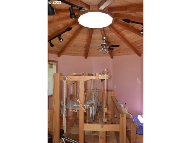 a house with trees in the background