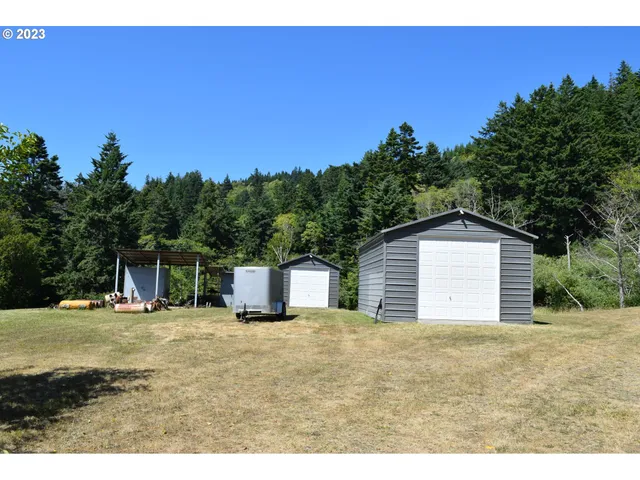 a backyard of a house with wooden fence