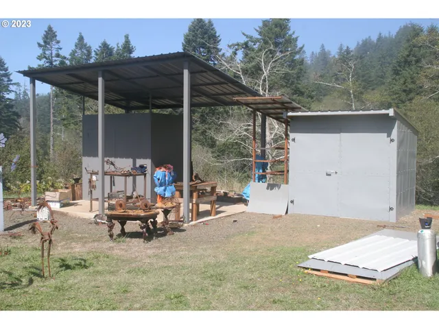 a view of a street with trees in the background
