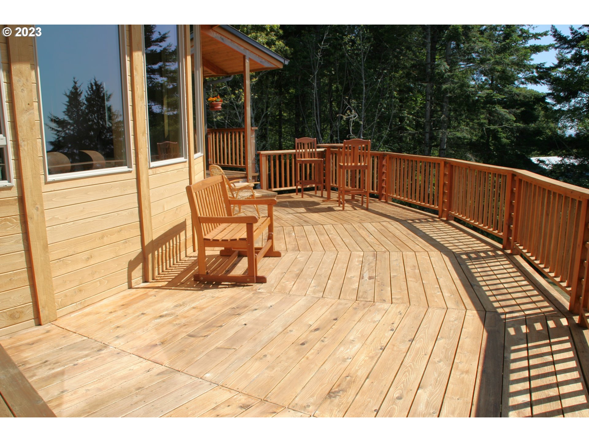 35606 Coy Creek Road Gold Beach, OR 97444 - Photo 5 of 48 a view of a swimming pool with a patio