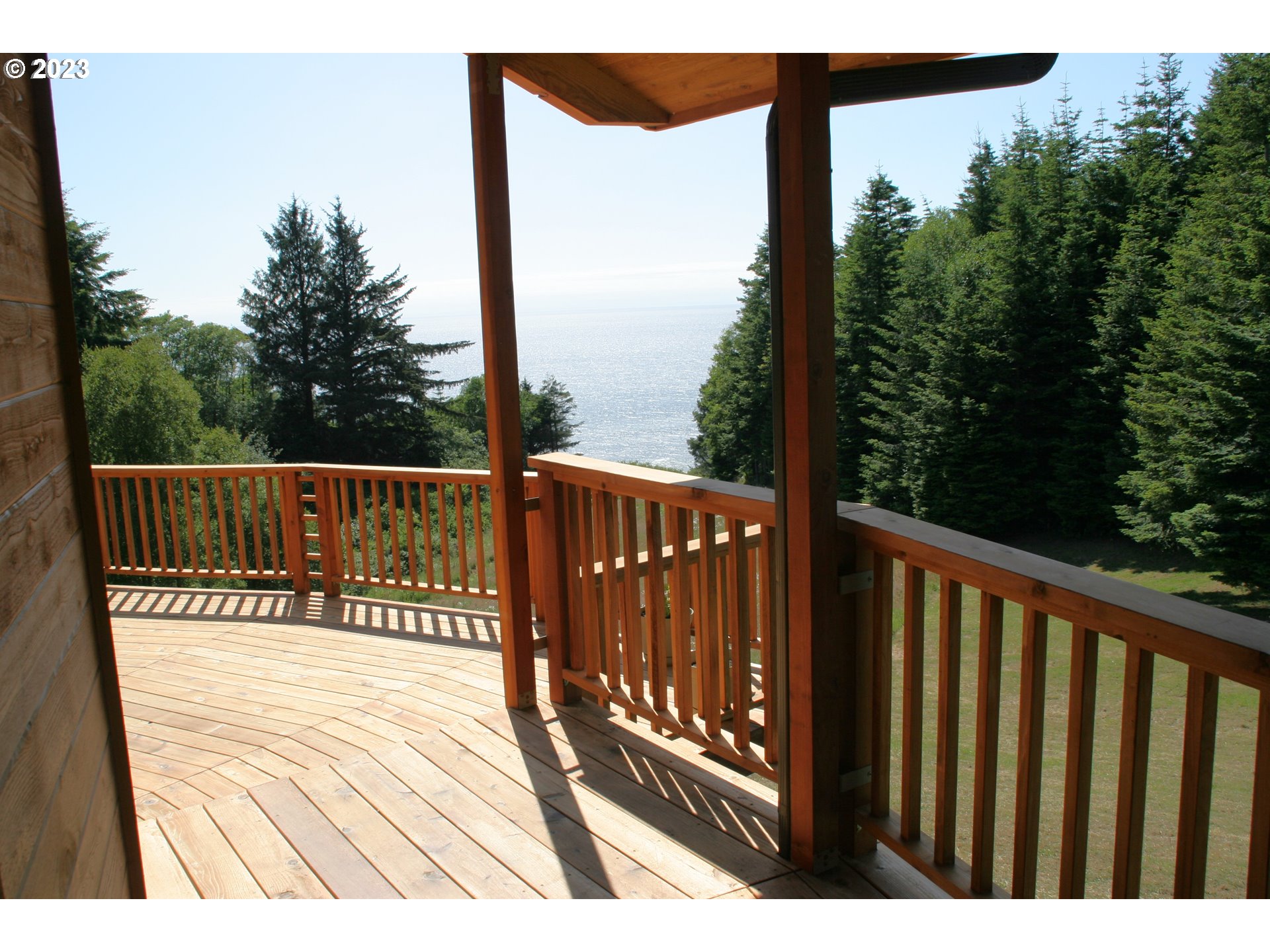 35606 Coy Creek Road Gold Beach, OR 97444 - Photo 7 of 48 a view of balcony with wooden floor