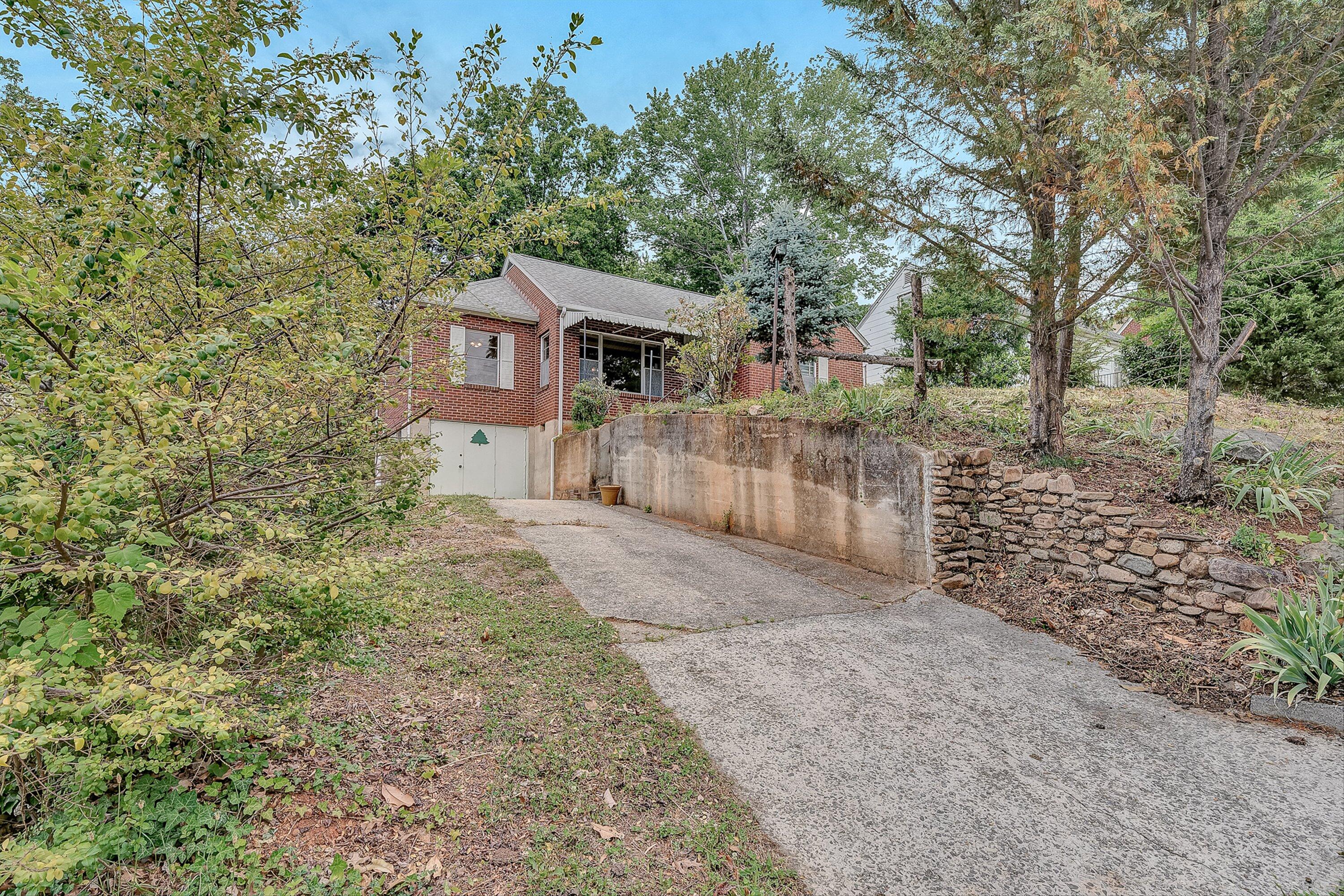 1917 Langdon Road Southwest Roanoke, VA 24015 - Photo 3 of 42 a view of a house with a yard