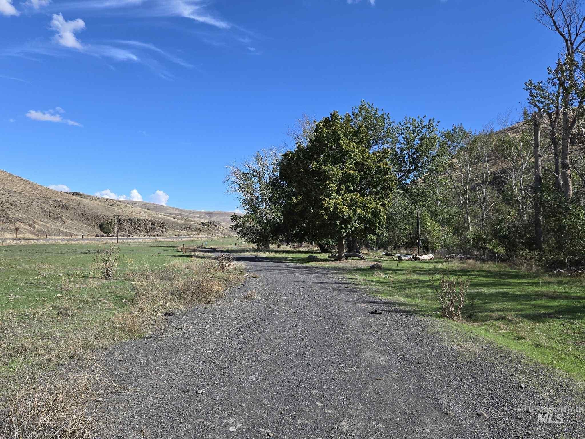 13761 Asotin Creek Road Asotin, WA 99402 - Photo 25 of 44 View of dirt / gravel road featuring a view of rural / pastoral area