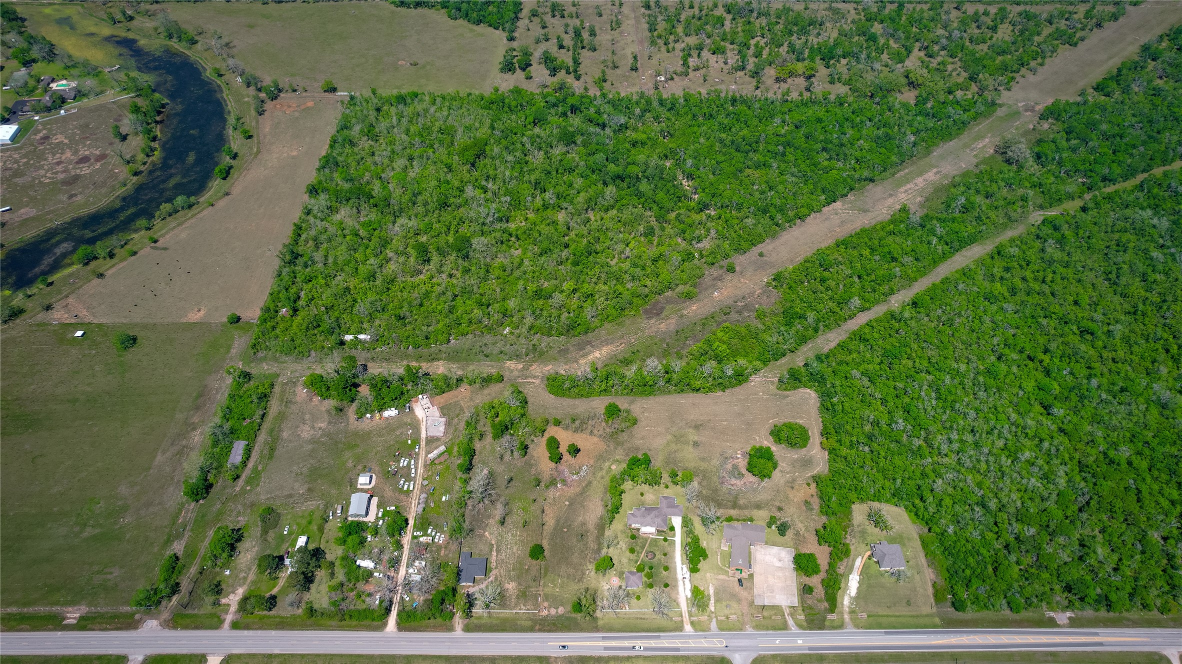 2932 West Farm To Market 1462 Rosharon, TX 77583 - Photo 16 of 20 an aerial view of a residential houses with outdoor space and street view