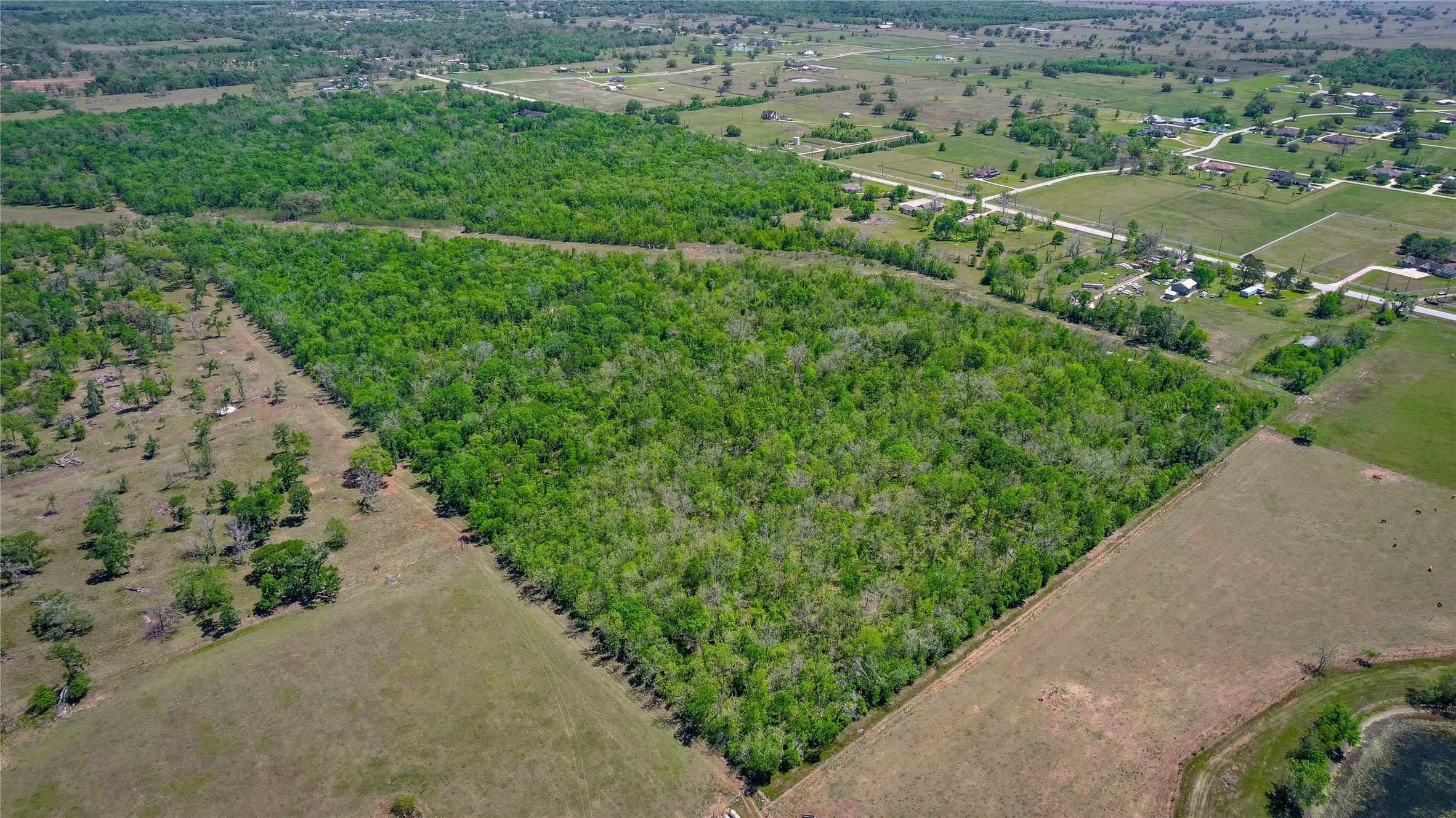 2932 West Farm To Market 1462 Rosharon, TX 77583 - Photo 4 of 20 a view of a street with a park