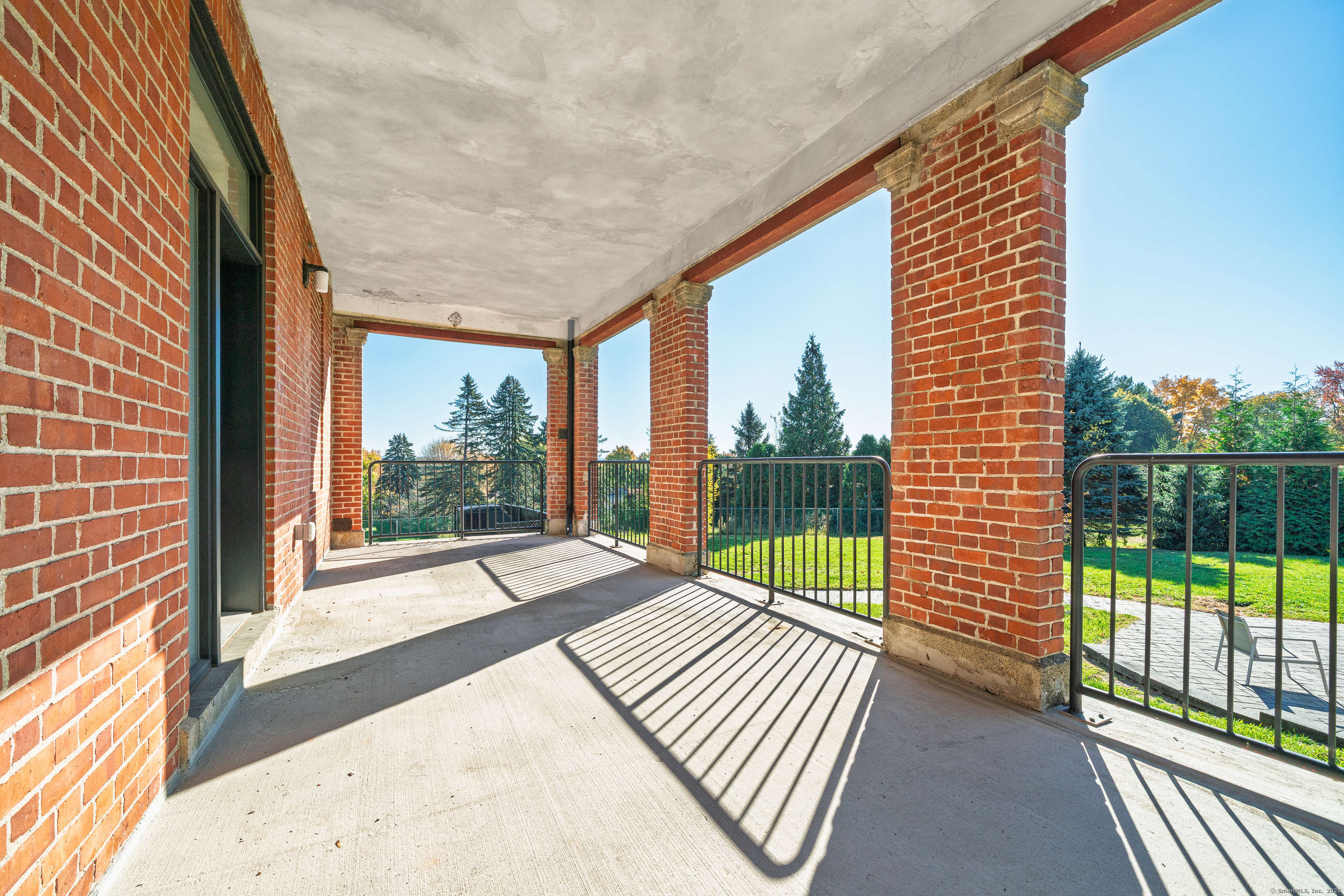 170 Ridge Road, Unit 103 Wethersfield, CT 06109 - Photo 22 of 24 a view of a house with a porch