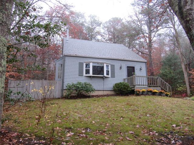 67 Deerfield Road Mashpee, MA 02649 - Photo 26 of 27 a view of a house with a yard and plants